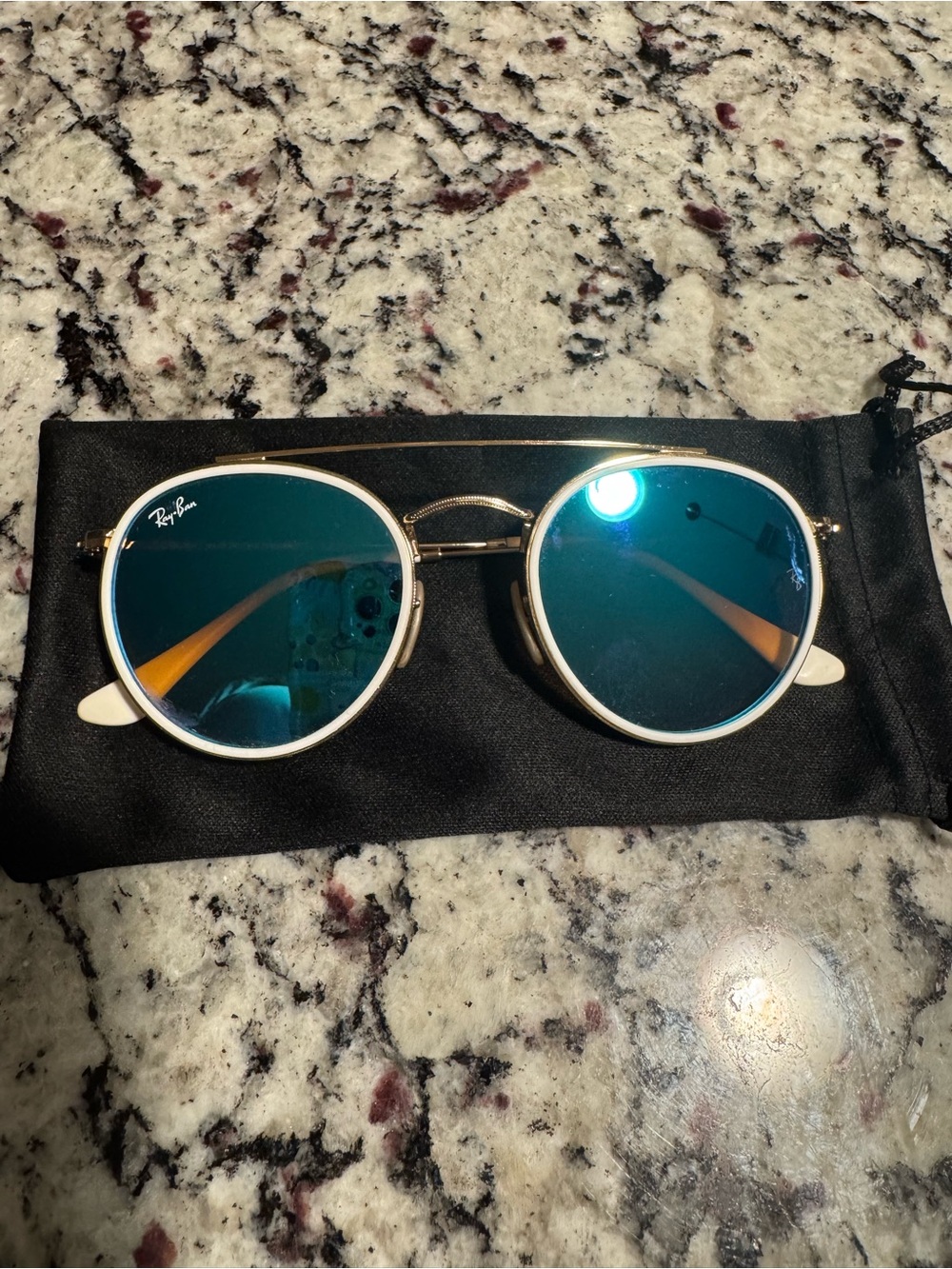 Ray-Ban Round Metal Sunglasses with Teal Blue Lenses and Gold Frame